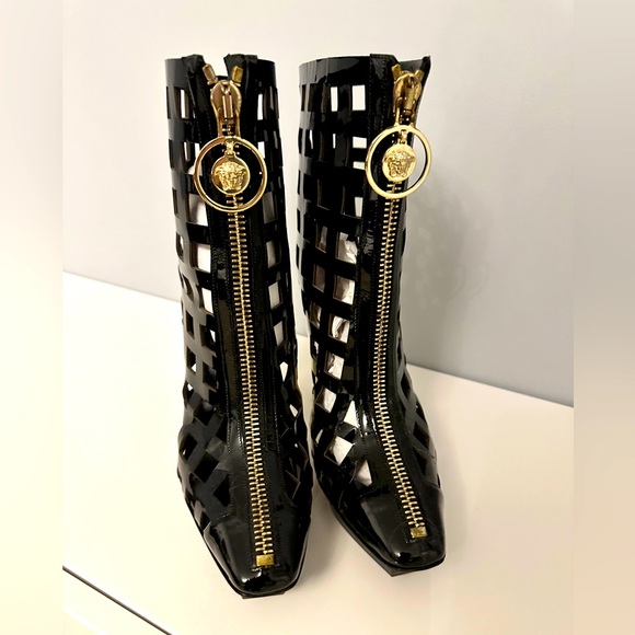 Versace Shoes - Versace Boots 
Glamorous and stylistic. This statement piece was  worn once.